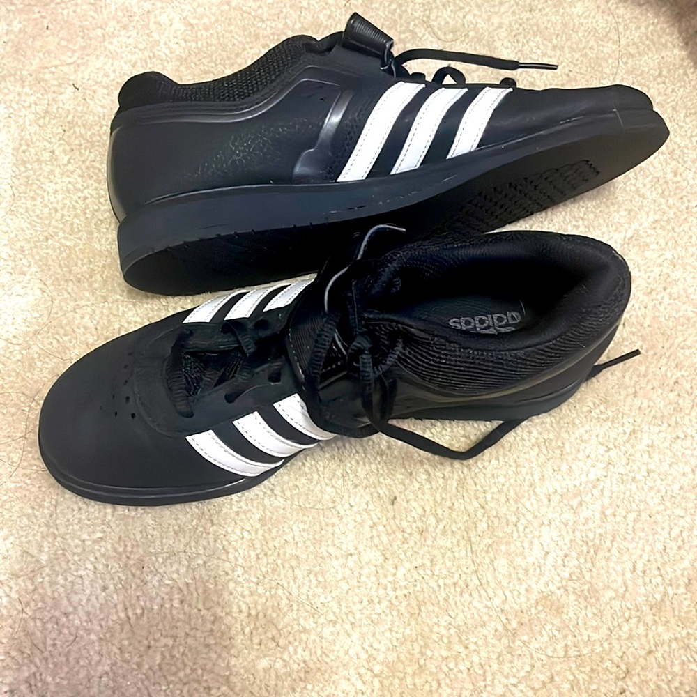 Adidas lifting shoes in men’s size 7 and women’s 9